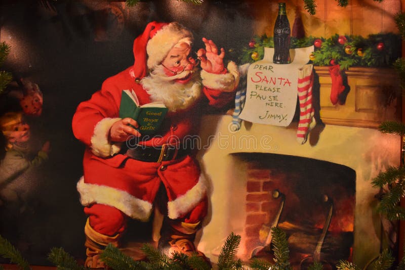 Pittura d'annata di Santa Claus dal camino nell'area internazionale dell'azionamento fotografia stock libera da diritti