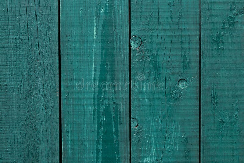 Pittura incrinata del recinto di legno I bordi di legno approssimativi hanno dipinto verde Fondo di legno di struttura, recinto d fotografia stock libera da diritti Pittura incrinata del recinto di legno I bordi di legno approssimativi hanno dipinto verde Fondo di legno di struttura, recinto d fotografia stock libera da diritti