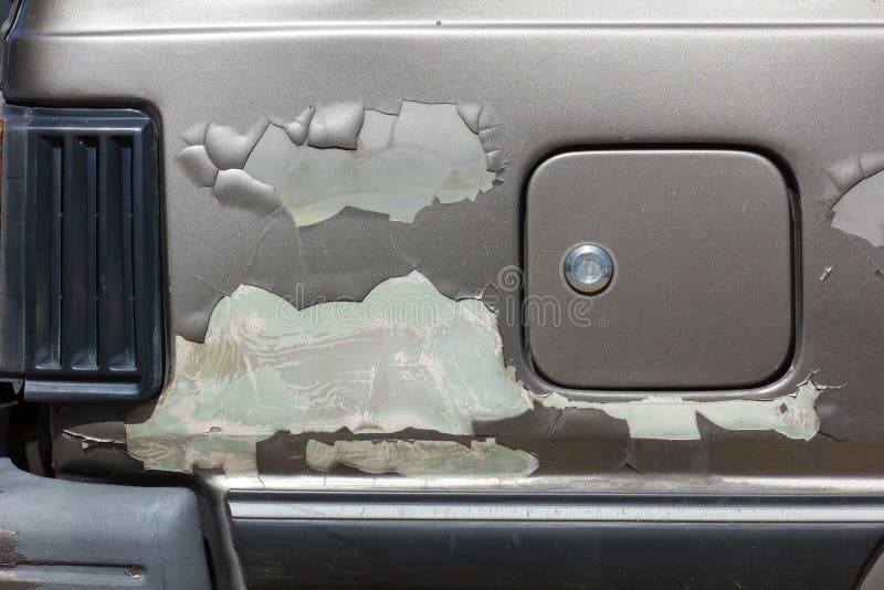 Pittura incrinata sulla carrozzeria immagini stock libere da diritti Pittura incrinata sulla carrozzeria immagini stock libere da diritti