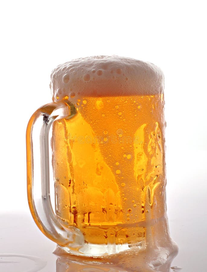 Chill beer overflow on mug. Chill beer overflow on mug