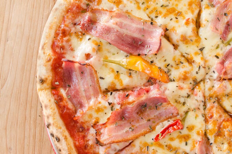 Pizza with Egg, Bacon, Ham, Sour Creme, Salami and Pepperoni Top View