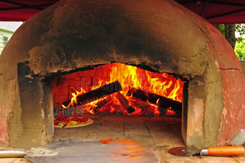 Pizza cooking in an oven