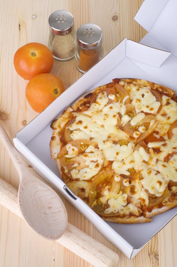 Pizza delivery stock image. Image of eating, fast, gourmet 12817577