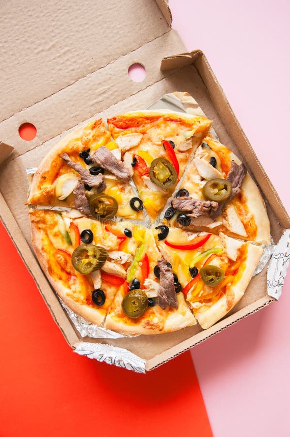 Pizza Delivery Concept. Hot Pizza in a Pizza Box. Stock Photo Image