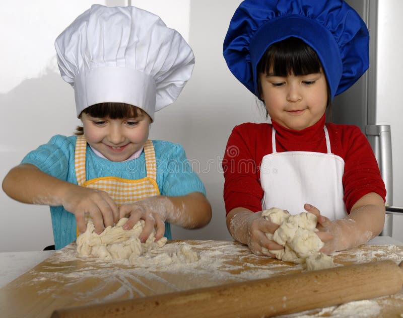Pizza dough girls. stock image. Image of collaboration 25593157