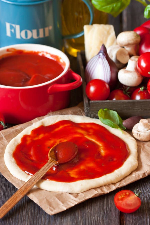 Pizza Dough With Tomato Sauce Preparation Stock Photo Image of chef