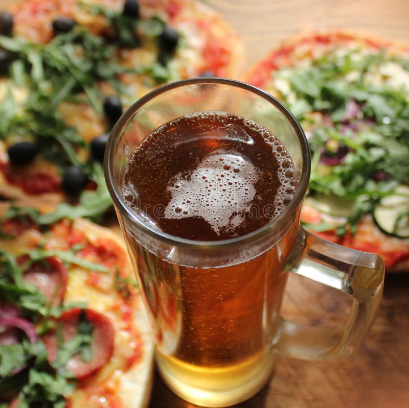 Pizza with glass of beer