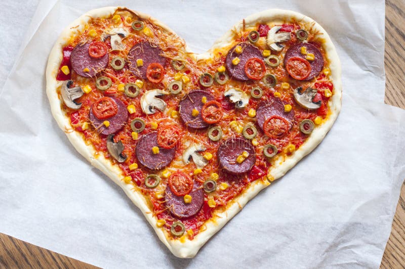 Pizza heart shaped with pepperoni