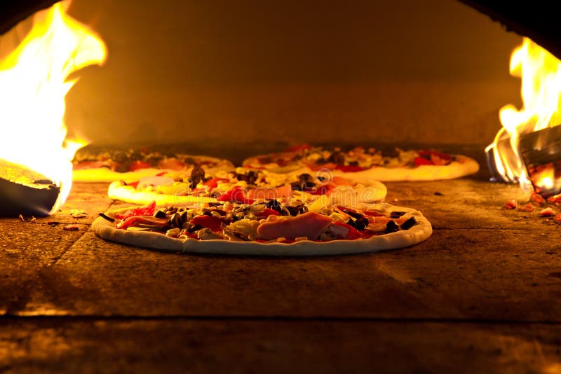 Pizza cooking in a tradition oven. Pizza cooking in a tradition oven