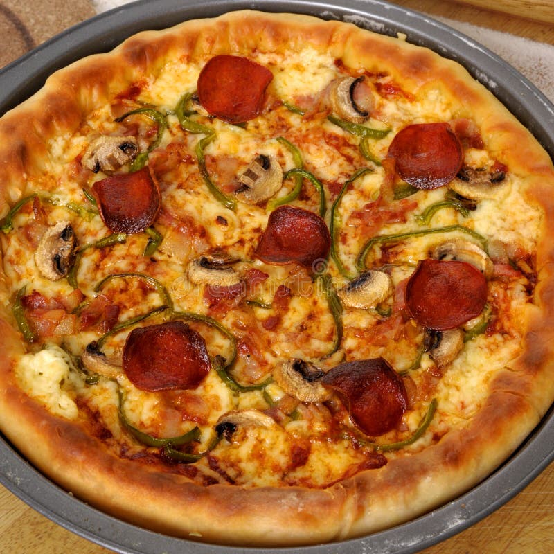 Pizza with ingredients stock image. Image of making 167356943