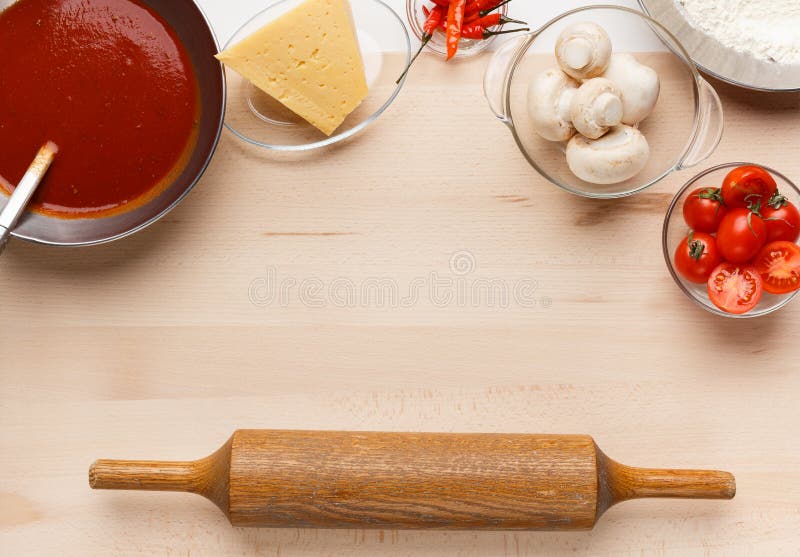 Pizza making background with various ingredients, top view royalty free stock photos