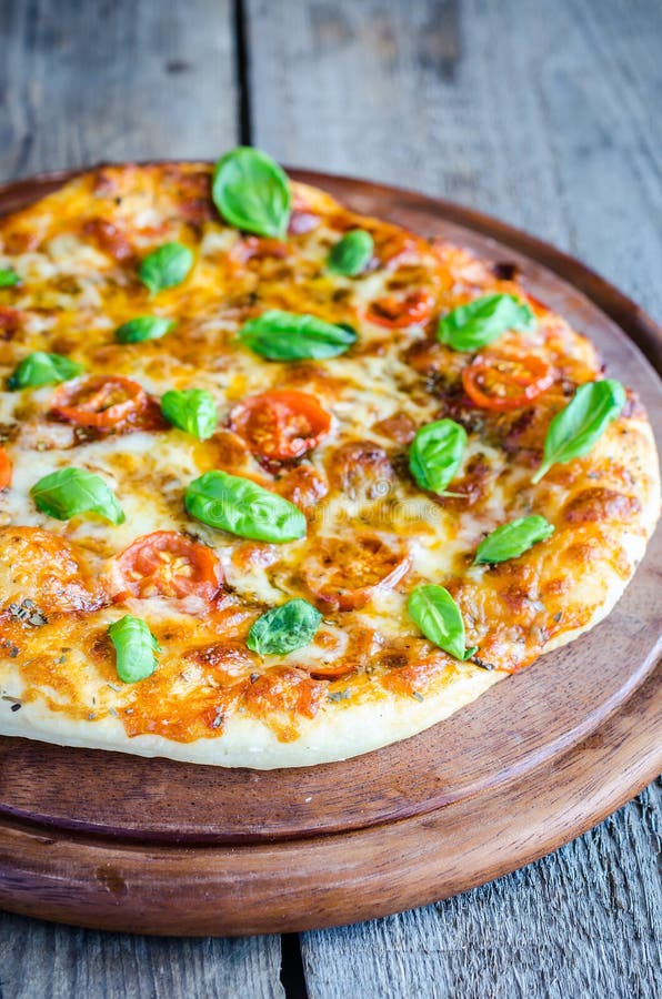 Pizza Margherita homemade stock photo. Image of crispy 38734084