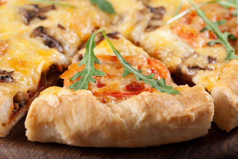 Pizza with mushroom and tomatoes