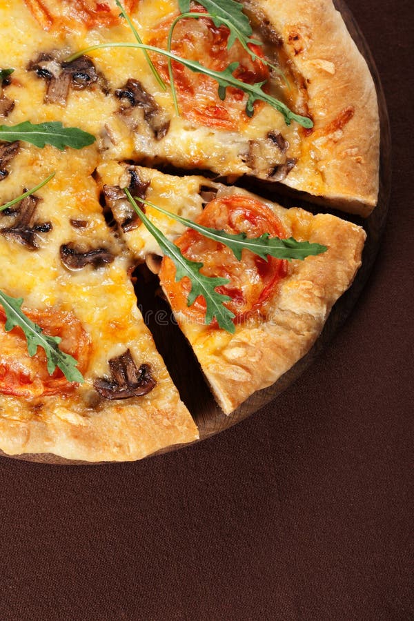 Pizza with mushroom and tomatoes