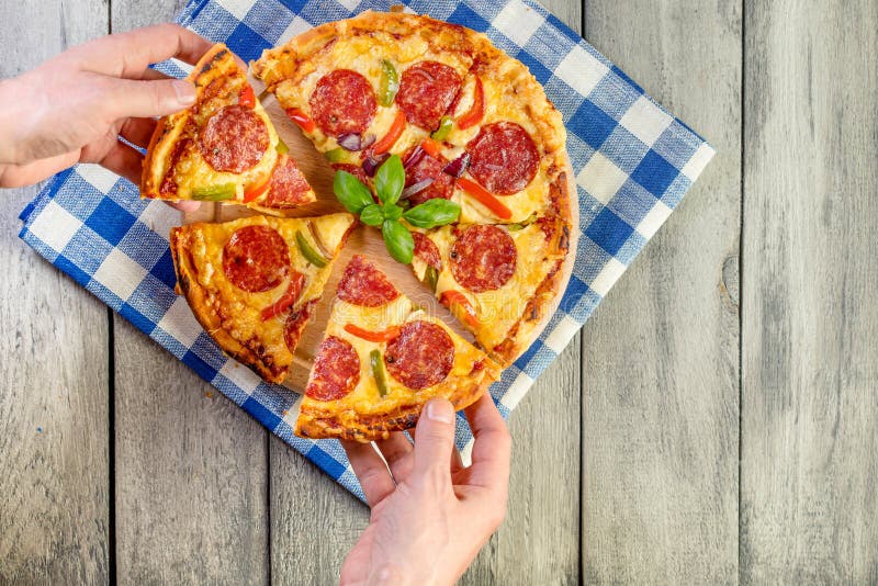 Pizza Pepperoni Cut into Pieces. Stock Photo Image of dinner, cooked