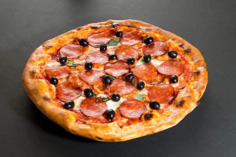 Pizza with Pepperoni Sausage and Olives Side View Stock Image Image