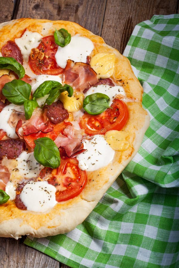 Pizza with Salami, Tomato and Ham Stock Photo Image of pizza, caloric 39190726