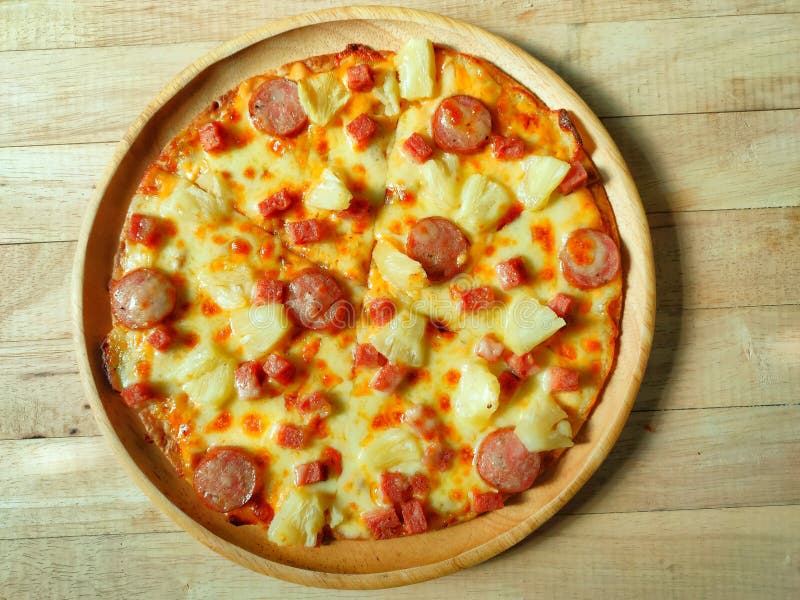 Thin crispy pizza on a delicious wooden tray stock photos