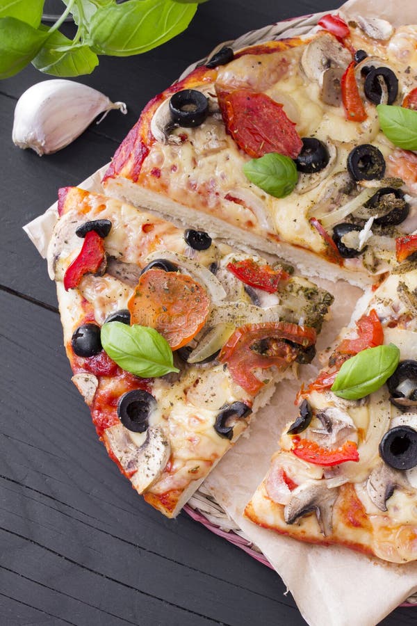 Pizza with Tomatoes, Mushrooms, Olives and Peppers Stock Photo - Image ...