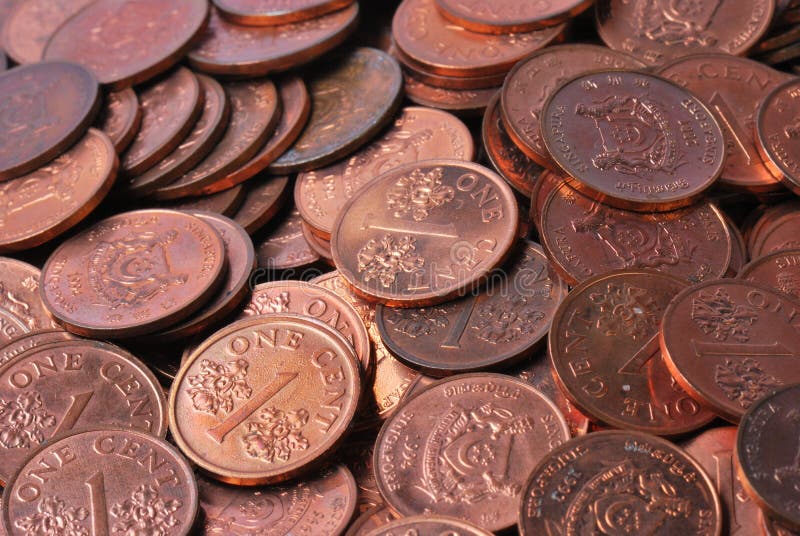 A closeup photo taken on many singapore one cent coins. Its the cents that make up the dollars. A closeup photo taken on many singapore one cent coins. Its the cents that make up the dollars.