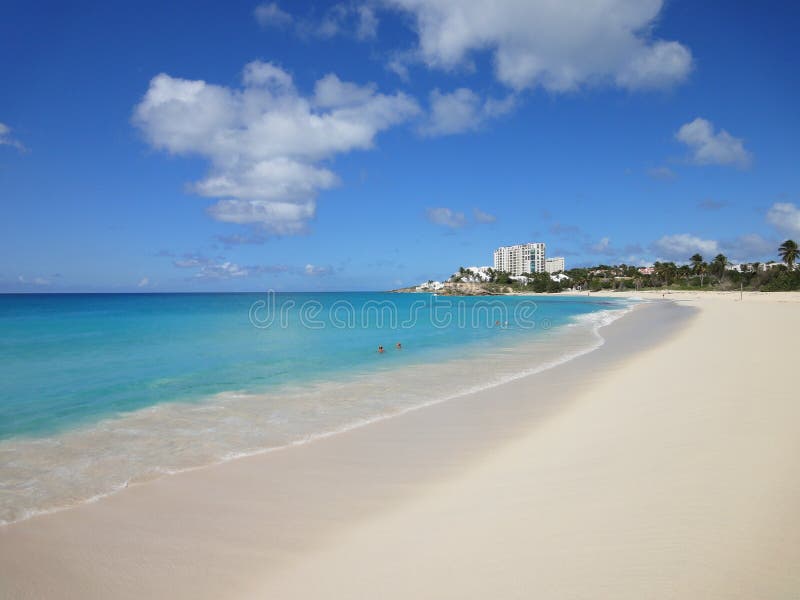Crystal clear water with nice white sandy beach in St. Maarten. One of the most beautiful and relaxing beaches in the Caribbean. Crystal clear water with nice white sandy beach in St. Maarten. One of the most beautiful and relaxing beaches in the Caribbean.