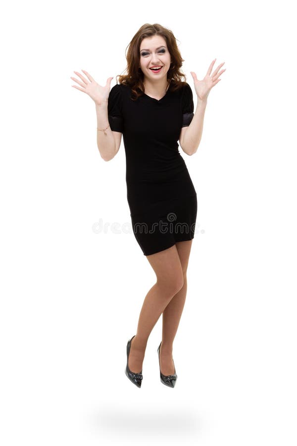 Brunetki dziewczyna jest ubranym smokingowego doskakiwanie zdjęcia stock Brunetki dziewczyna jest ubranym smokingowego doskakiwanie zdjęcia stock