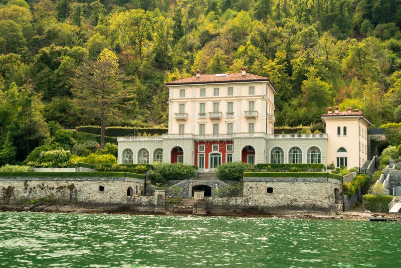 Lake Como,Italy: September 3,2022- A view of a luxury villa on Lake Como. Lake Como,Italy: September 3,2022- A view of a luxury villa on Lake Como