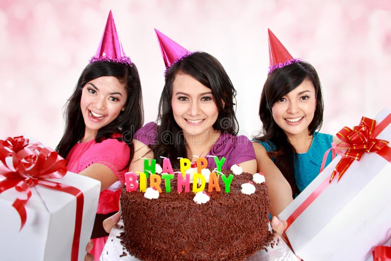 Three young beautiful girls celebrate birthday. Three young beautiful girls celebrate birthday