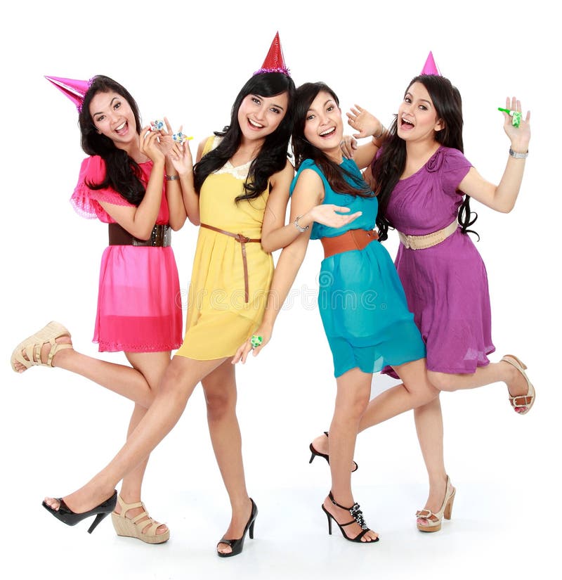 Excited four young beautiful girls celebrate birthday isolated over white background. Excited four young beautiful girls celebrate birthday isolated over white background