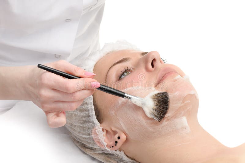 Piękno salon, twarzowy maskowy stosować zdjęcie stock Piękno salon, twarzowy maskowy stosować zdjęcie stock