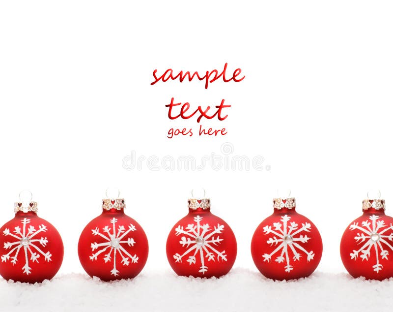 Row of Christmas balls in snow. Isolated on white. Row of Christmas balls in snow. Isolated on white.