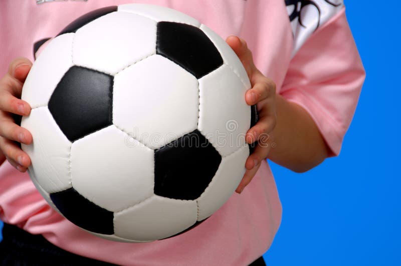 piłka futbolowa gospodarstwa fotografia stock piłka futbolowa gospodarstwa fotografia stock