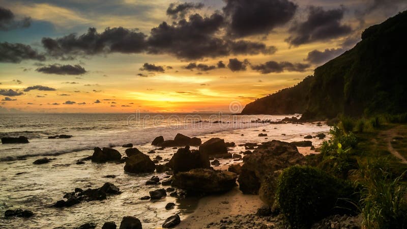 pla?owy wyspy Phuket zmierzch Thailand tropikalny Menganti plaża, Kebumen, Środkowy Jawa, Indonezja fotografia stock pla?owy wyspy Phuket zmierzch Thailand tropikalny Menganti plaża, Kebumen, Środkowy Jawa, Indonezja fotografia stock