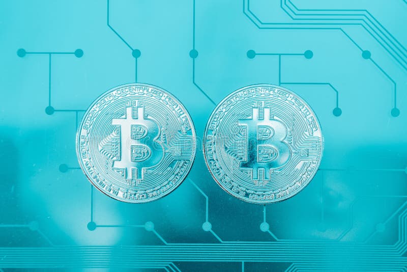 Placa de circuito con un bitcoin foto de archivo libre de regalías Placa de circuito con un bitcoin foto de archivo libre de regalías
