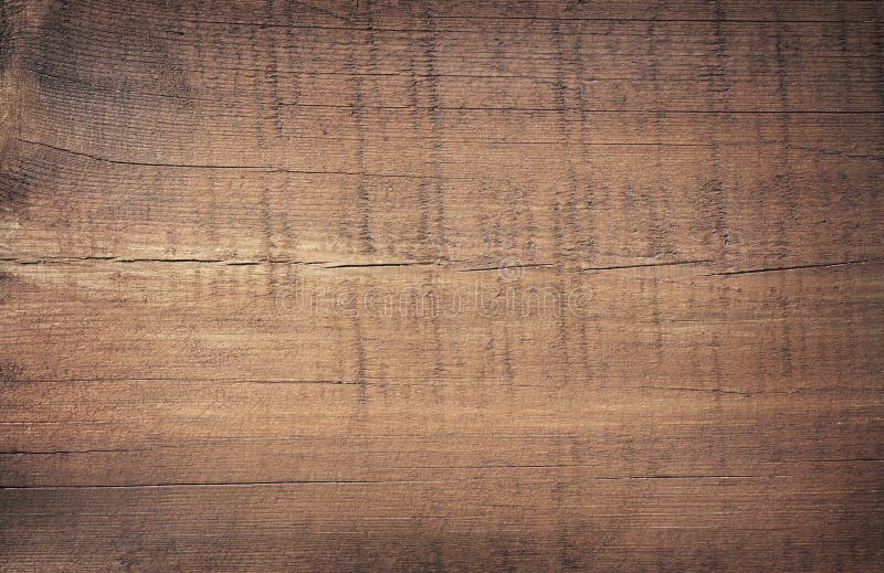 Tábua de corte de madeira escura e riscada. Textura de madeira foto de stock