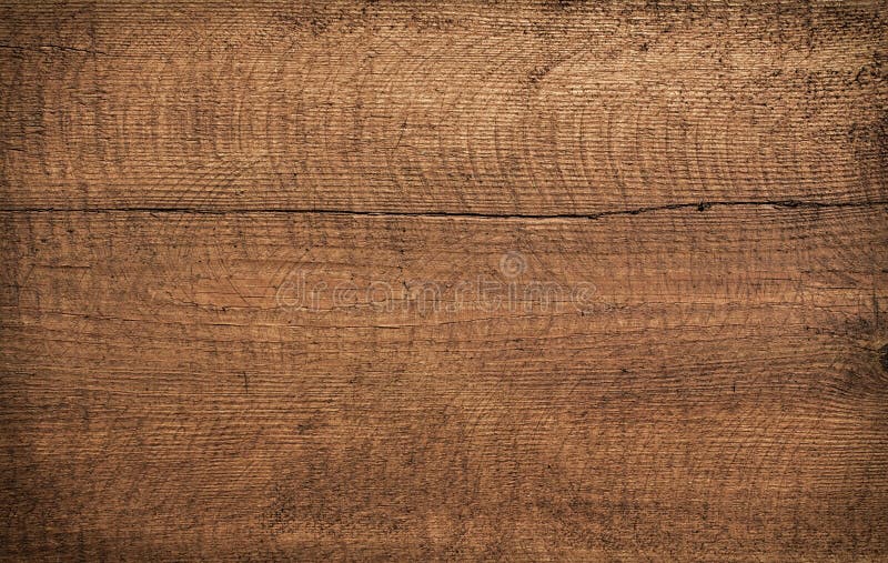 Tábua de corte de madeira escura e riscada. Textura de madeira foto de stock royalty free