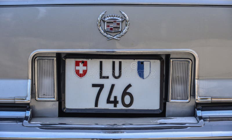 Placa de registro suíça do vintage Cadillac imagem de stock Placa de registro suíça do vintage Cadillac imagem de stock