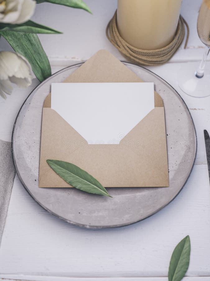 Envelope with an Elegant Wedding Invitation. Place Card Mockup. Stock