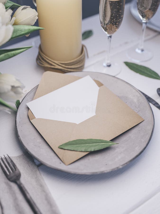 Envelope with an Elegant Wedding Invitation. Place Card Mockup. Stock