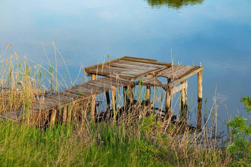 A Place for Fishing in the Form of a Wooden Pier on the River Bank with ...