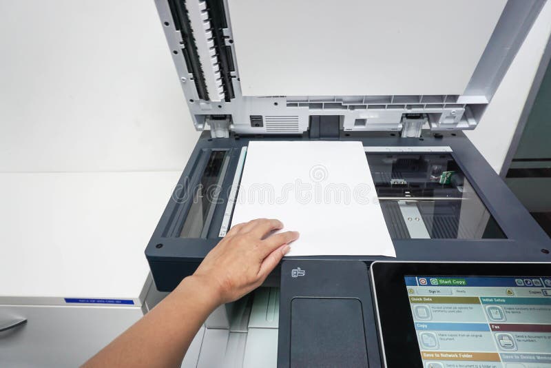 Place paper on printer plate for scanning