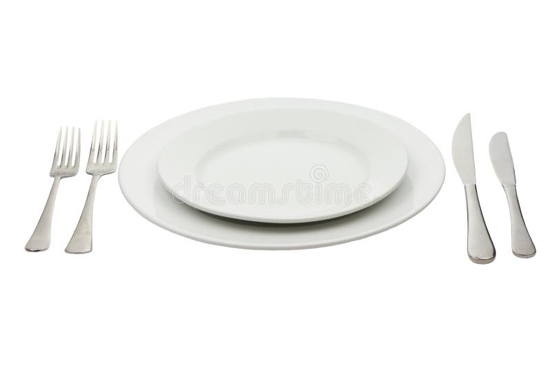 Place setting with high-gloss plate, knife & fork royalty free stock photo