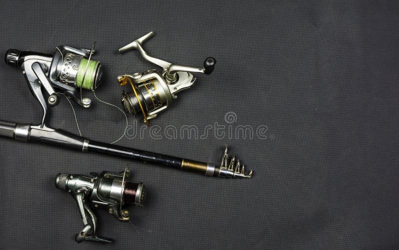 https://thumbs.dreamstime.com/b/place-your-ad-text-shop-log-next-to-fishing-rods-reels-dark-background-store-logos-104118662.jpg