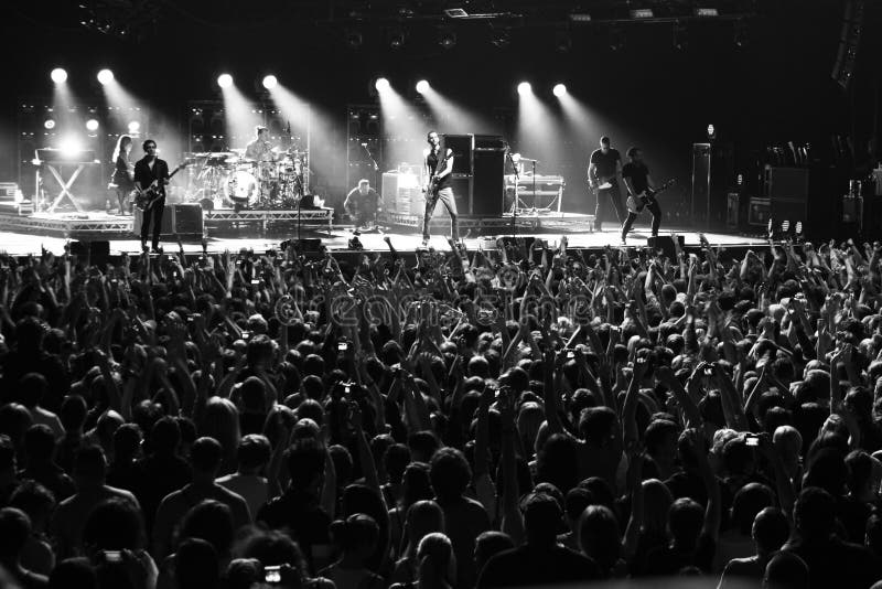 MINSK, BELARUS - SEPT 22: Rock band Placebo and Brian Molko in concert at Sport Palace on Saturday, September 22, 2012 in Minsk, Belarus. MINSK, BELARUS - SEPT 22: Rock band Placebo and Brian Molko in concert at Sport Palace on Saturday, September 22, 2012 in Minsk, Belarus