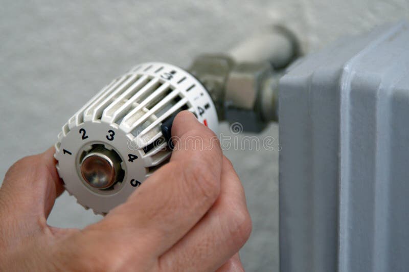 Placez le thermostat de radiateur en plan rapproché image libre de droits Placez le thermostat de radiateur en plan rapproché image libre de droits
