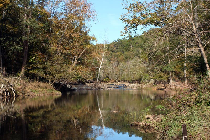 The Eno River Edged by a Forest during the Fall at Eno River State Park ...