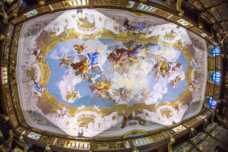 MELK, AUSTRIA - APRIL 23, 2015: ceiling of the luxurious interior of the Library in Melk Abbeyin Melk, Austria. Famous Melk Abbey Library has over 100,000 Volumes in Collection. MELK, AUSTRIA - APRIL 23, 2015: ceiling of the luxurious interior of the Library in Melk Abbeyin Melk, Austria. Famous Melk Abbey Library has over 100,000 Volumes in Collection.