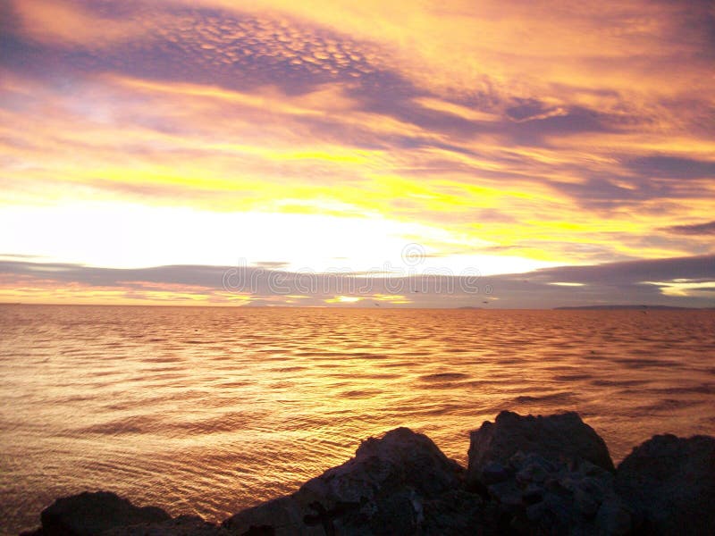 Plage de plage de coucher du soleil de Coucher de soleil images libres de droits Plage de plage de coucher du soleil de Coucher de soleil images libres de droits