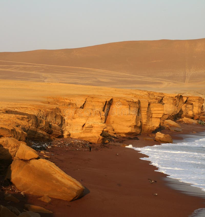 The beautiful red beach in the paracas nature reserve in peru, south america. The beautiful red beach in the paracas nature reserve in peru, south america