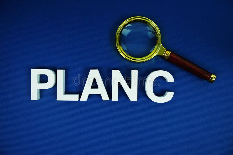 Plan C alphabet letters with magnifying glass top view on blue background Business and Communications concept. Alphabet project stock images, royalty-free photos and pictures